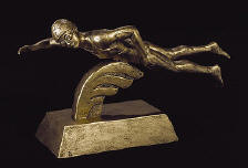 pdu swim female sculpture gold.jpg (41198 bytes)